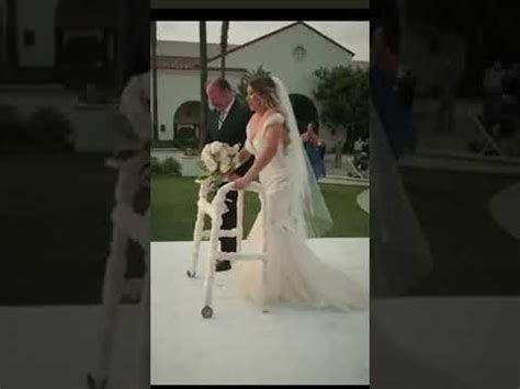 Emotional moment disabled bride walks down the aisle